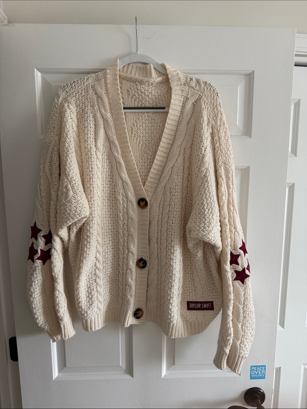 Taylor Swift “RED” Cream Cable Knit Cardigan with Burgundy Star Sleeves